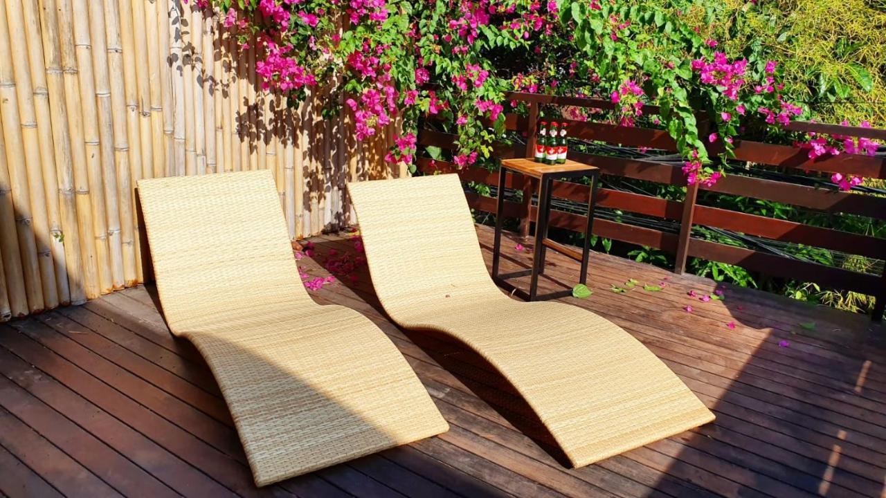 Stellar Capsules Hostel Seminyak  Exterior photo A pair of chaise longues