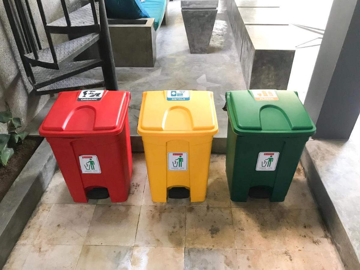 Stellar Capsules Hostel Seminyak  Exterior photo Waste bins for recycling in a university