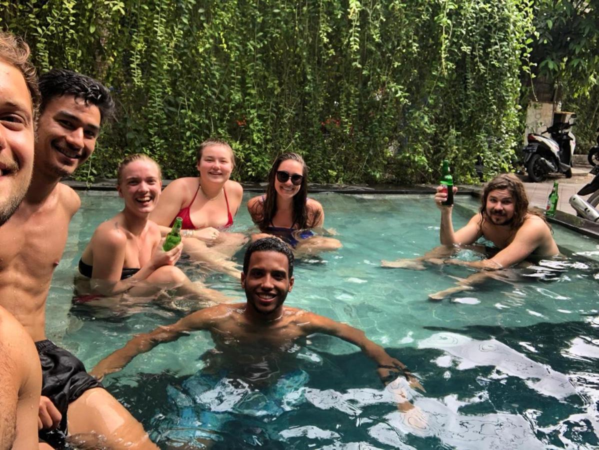 Stellar Capsules Hostel Seminyak  Exterior photo A group of tourists in Bali