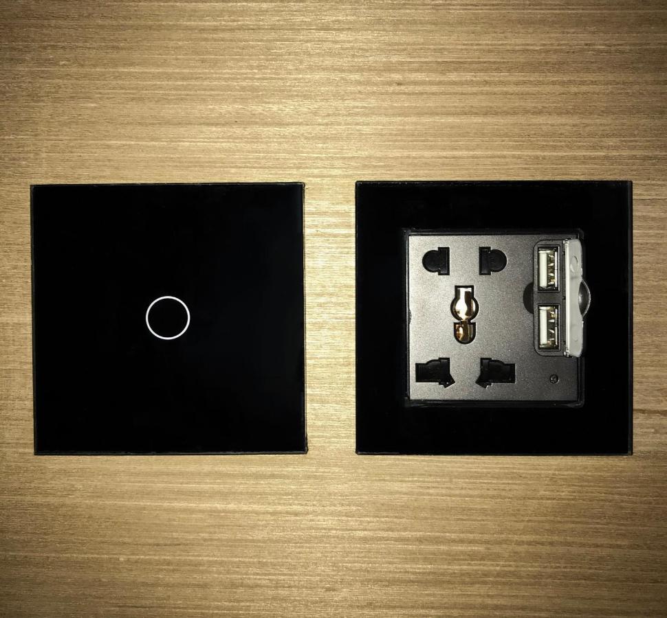 Stellar Capsules Hostel Seminyak  Exterior photo A wall-mounted USB charger